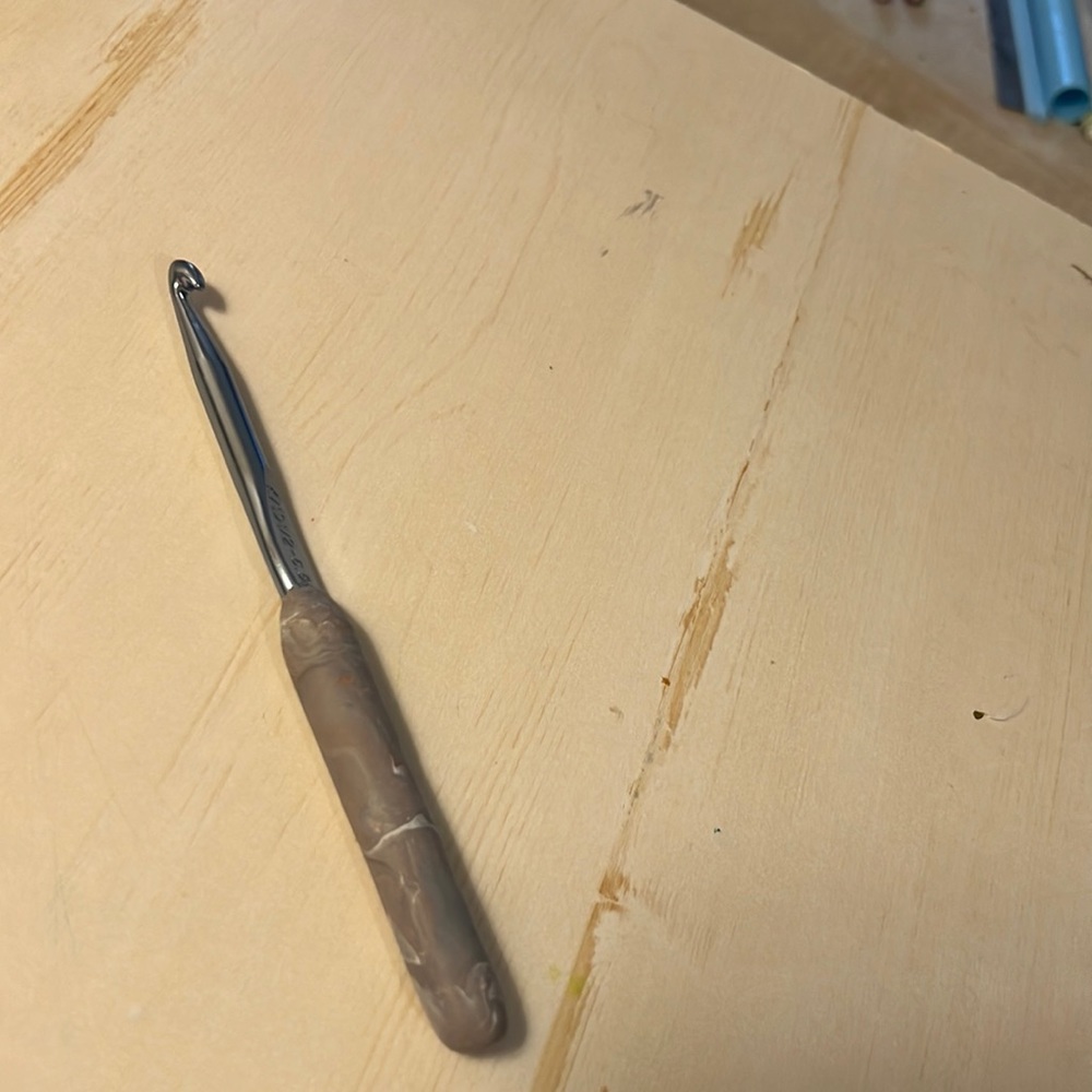 Crochet hook with handmade clay handle